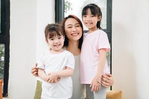 Image of young Asian mother and daughter at home photo