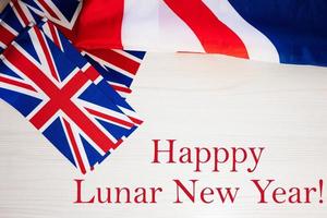 Happy Lunar New Year. British holidays concept. Holiday in United Kingdom. Great Britain flag background. photo