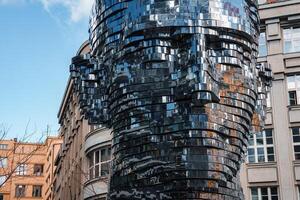 David Cerny head sculpture of Franz Kafka head in Prague. photo