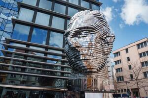 David Cerny head sculpture of Franz Kafka head in Prague. photo
