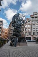 David Cerny head sculpture of Franz Kafka head in Prague. photo