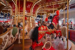 Old French carousel in a holiday park. photo