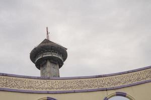 Main tower on Great agung mosque on the Semarang Central Java, when day time and blue sky. The photo is suitable to use for Ramadhan poster and Muslim content media.