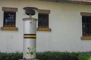 Old bell steam alarm for railway station. The photo is suitable to use for travel destination, holiday poster and travel content media.