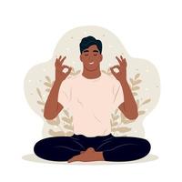 The boy is doing her favorite hobby. Young man meditating with eyes closed and legs crossed outdoors.International Yoga Day. vector
