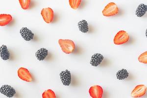 Fresh blackberries and strawberries photo