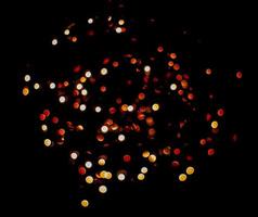 abstract bokeh background of golden light burst made from bokeh motion. photo