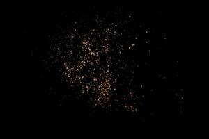 abstract bokeh background of golden light burst made from bokeh motion. photo