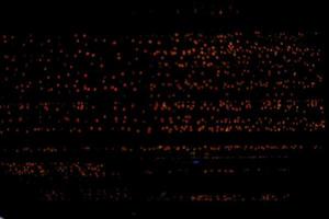 abstract bokeh background of golden light burst made from bokeh motion. photo