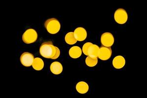 abstract bokeh background of golden light burst made from bokeh motion. photo