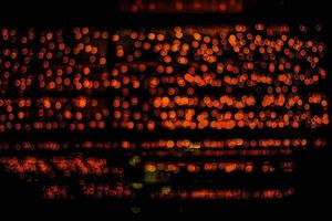 abstract bokeh background of golden light burst made from bokeh motion. photo