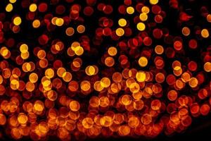 abstract bokeh background of golden light burst made from bokeh motion. photo