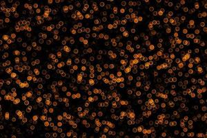 abstract bokeh background of golden light burst made from bokeh motion. photo