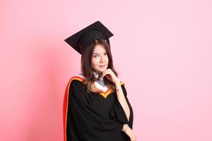 niña con graduación vestido foto