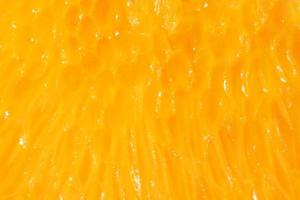 cerca arriba de pulpa de naranja textura foto