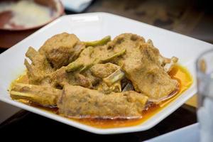 Nawabi food, Mutton curry with gravy. This types of food are too flavourful and delicious. photo