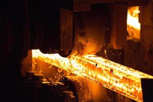 Steel slab being rolled on the Hot strip mill at Demra, Dhaka, Bangladesh photo