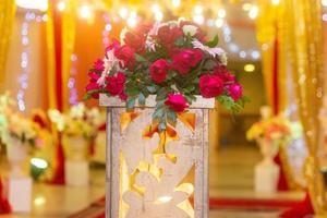 Colorful lighting with Flower brusts at wedding decoration in Bangladesh. photo