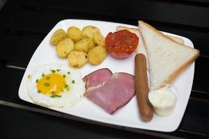 Continental breakfast one egg omelet, baked potato photo