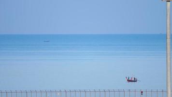 Longtail fisher boat near Mai Khao beach on Phuket Island, Thailand. video