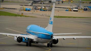 AMSTERDAM, THE NETHERLANDS JULY 29, 2017 - KLM Boeing 737 PH BGU towing before departure. Shiphol Airport, Amsterdam, Holland video