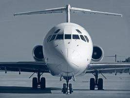 cockpit of plane standing in airport photo