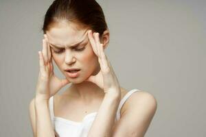 woman headache health problems stress isolated background photo