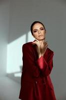 brunette bright makeup red jacket glamor model studio photo