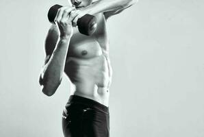 man with a pumped up torso exercise muscle workout posing photo