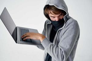 male thief hooded head hacking technology security isolated background photo
