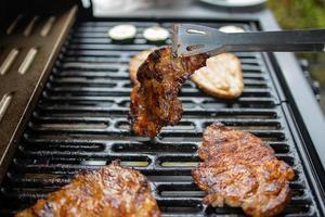 pork neck grilled on a gas grill. Closeup photo