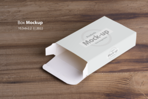 Opened empty pillbox on wooden table background psd