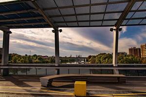 landscape of the pedestrian bridge of Zaragoza in a beautiful autumn day photo