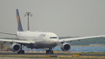 FRANKFURT AM MAIN, GERMANY JULY 19, 2017 - Lufthansa Airbus A330 turn to start before departure at runway 18. Fraport, Frankfurt, Germany video