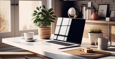 Modern workspace with blank screen laptop, white frame - image photo