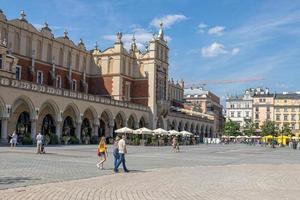 historic old town square in Krakow on a warm summer holiday day photo