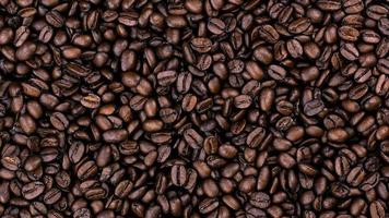 close up of coffee beans. Coffee beans and raw coffee. Zoom in .Top view video