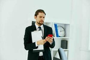 manager in the office with documents lifestyle photo