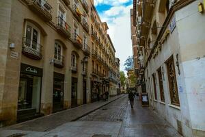 interesting urban landscape with narrow streets in the spanish city of Zaragoza on a spring day photo