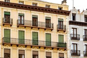 antique windows in buildings in the old town of Saragossa, Spain photo