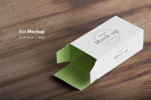 Opened empty pillbox on wooden table background psd