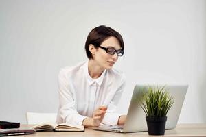 female manager in the office with glasses self-confidence Studio Lifestyle photo