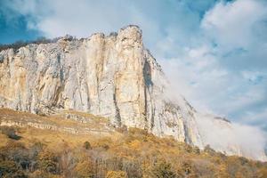 landscape autumn high mountains on blue sky dry grass fresh air photo