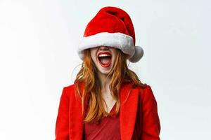 woman wearing santa hat holiday christmas fashion posing photo