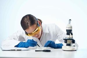 woman laboratory assistant research microscope diagnostics science photo