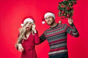 man and woman Christmas holiday Christmas tree New year emotions photo