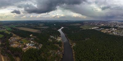 panoramic view from a high altitude of a meandering river in the forest photo