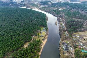 panoramic view from a high altitude of a meandering river in the forest photo