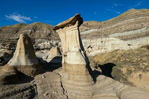 Hoodoos on a sunny day in September at Drumheller in Canada photo