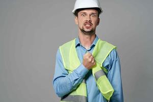 male builders protection Working profession isolated background photo